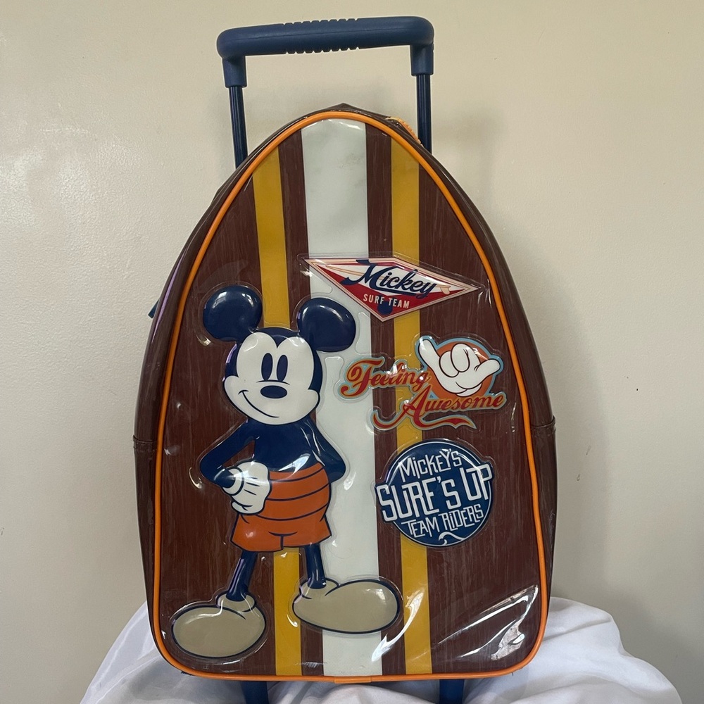 Mickey Mouse totally awesome surf team rolling luggage.